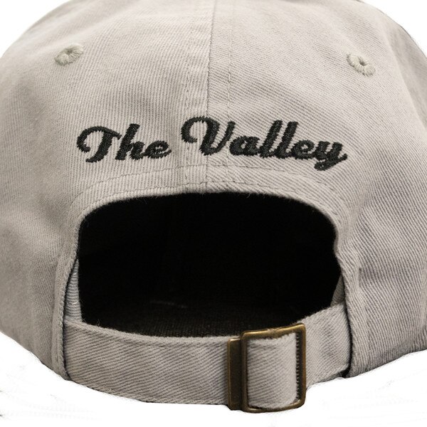CapX Vintage adjustable hat from the back with The Valley embroidered on the back, grey with black brim and accents